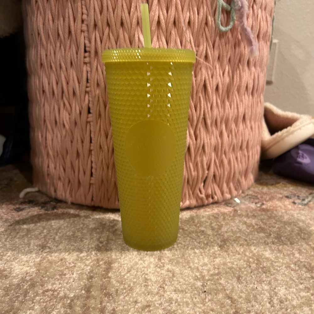 Glow in the dark neon green textured Starbucks cup